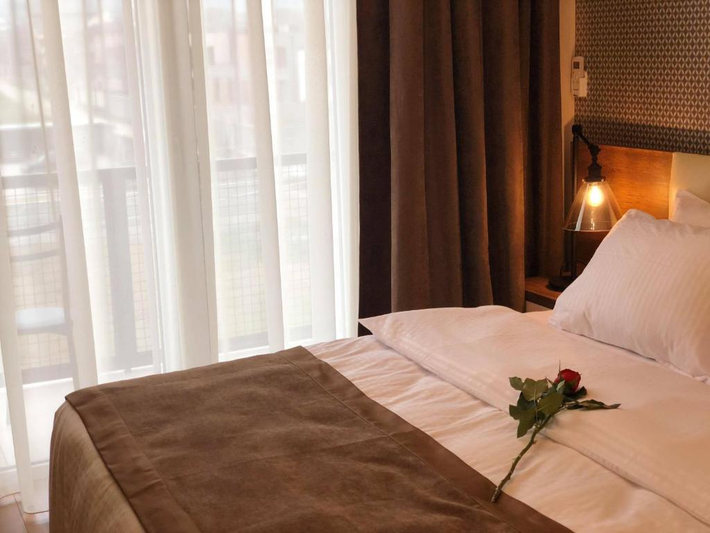 Postel nebo postele na pokoji v ubytování Hotel Amser