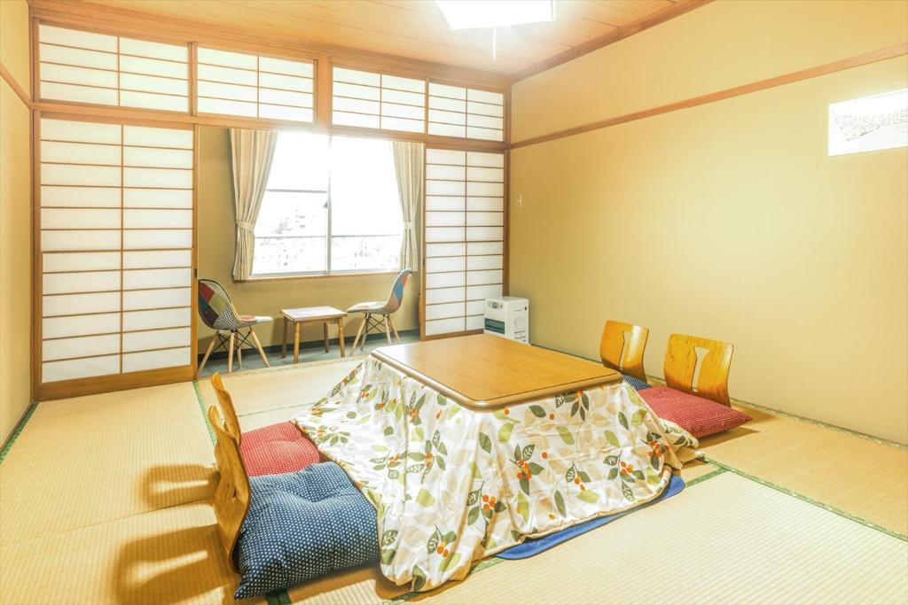 Postel nebo postele na pokoji v ubytování Hotel Ina