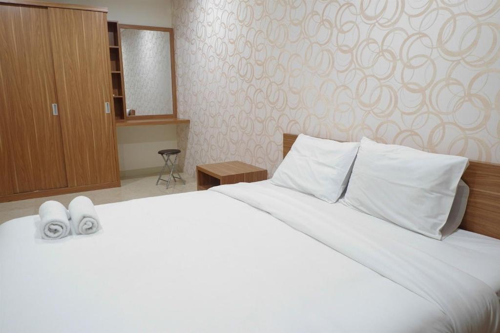 Affordable 2BR At L'Avenue Apartment By Travelio - Departamento