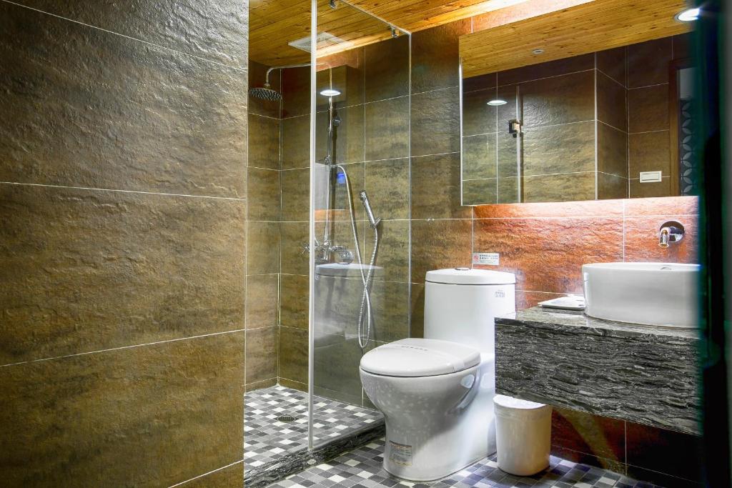 Koupelna v ubytování Cai She Hotel