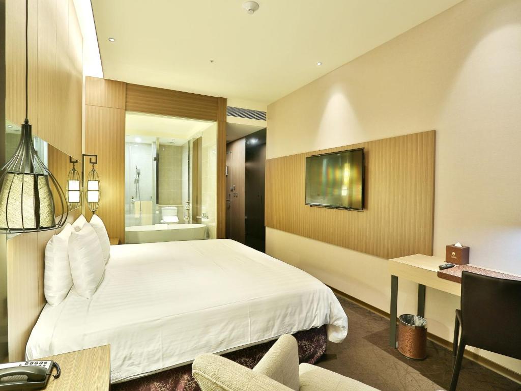 Postel nebo postele na pokoji v ubytování Hotel Intrendy
