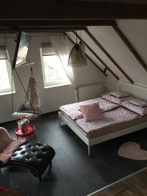 Postel nebo postele na pokoji v ubytování Viktória Inn Tihany