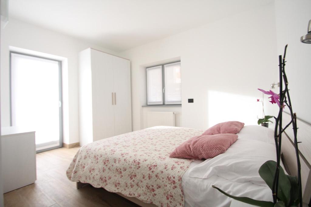 Postel nebo postele na pokoji v ubytování Casa ai Stabli