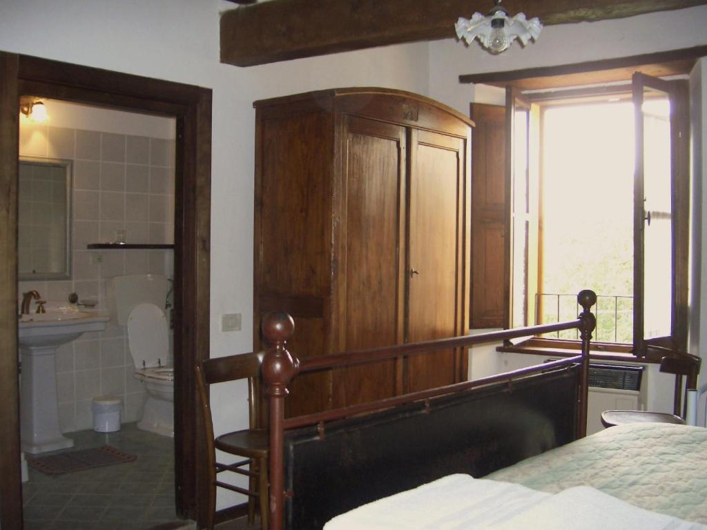 A bed or beds in a room at Villa Pascolo