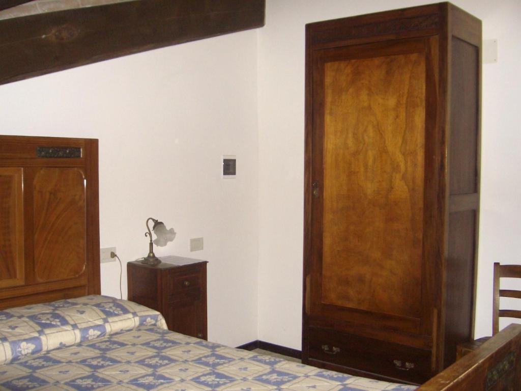 A bed or beds in a room at Villa Pascolo