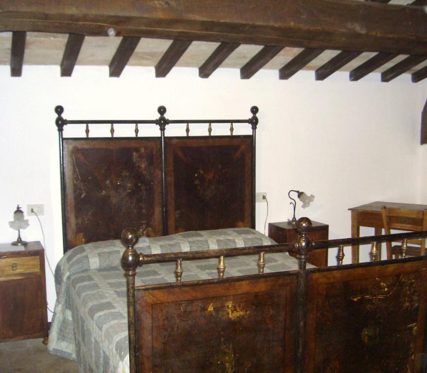 A bed or beds in a room at Villa Pascolo