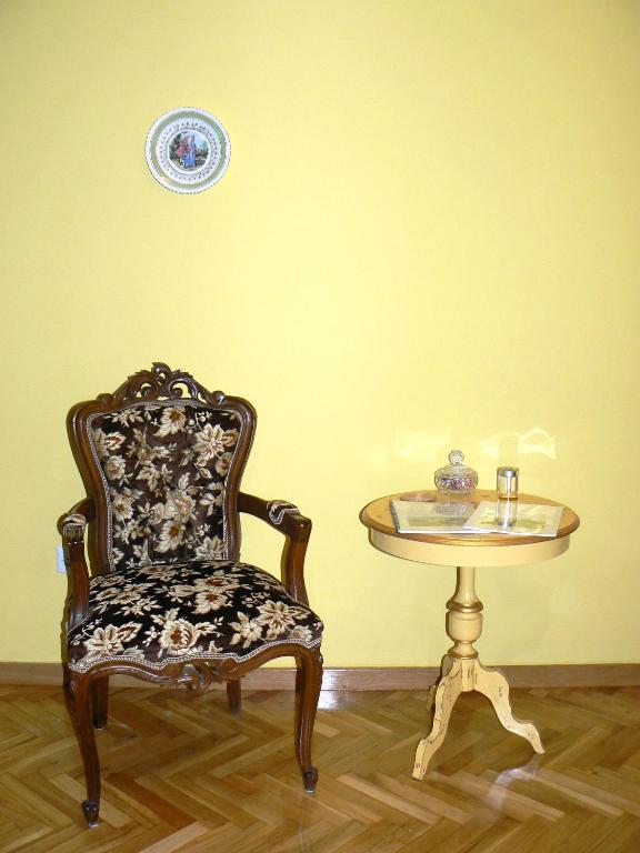 A seating area at Alpha Omega (AΩ) Vintage Suite