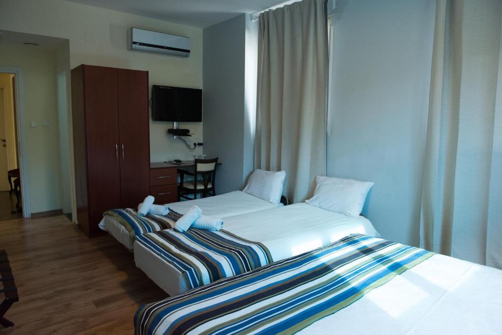 Postel nebo postele na pokoji v ubytování Villa Nazareth B&B