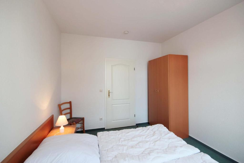 Postel nebo postele na pokoji v ubytování Villa Hans by Rujana
