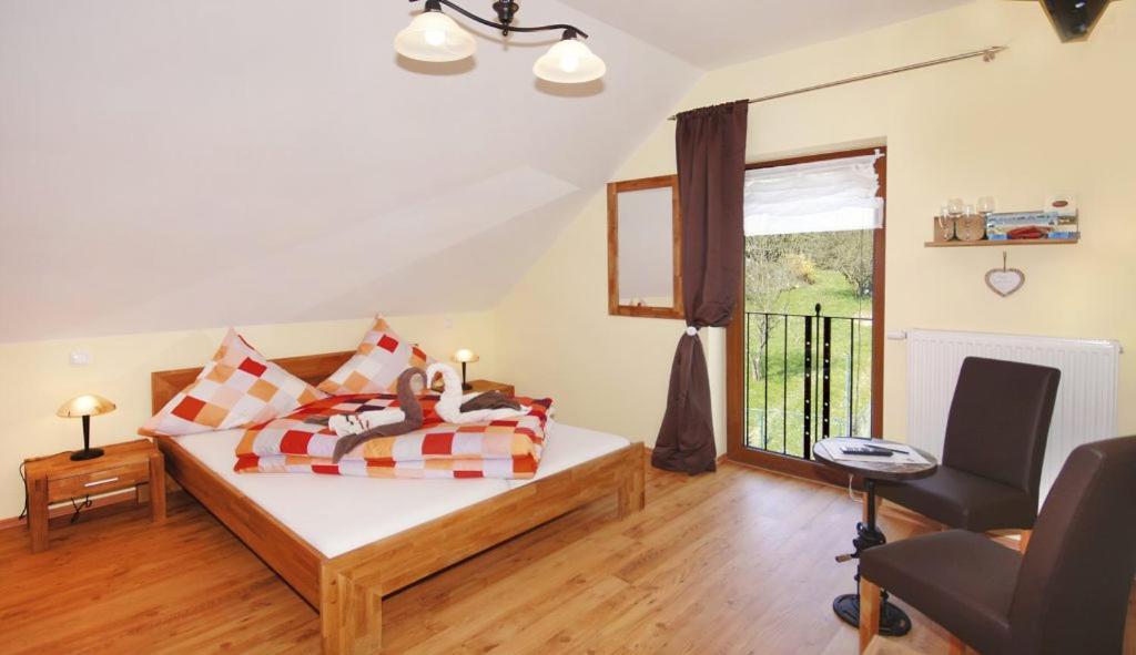 Postel nebo postele na pokoji v ubytování Gästezimmer Hans-Norbert Mack