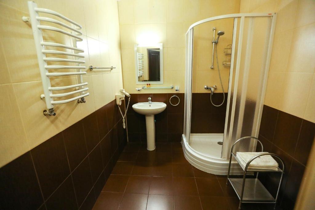 Koupelna v ubytování Home Hotel
