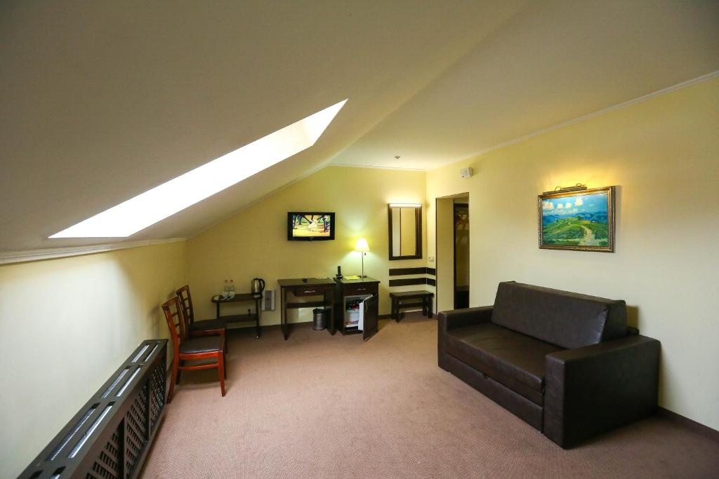 Posezení v ubytování Home Hotel