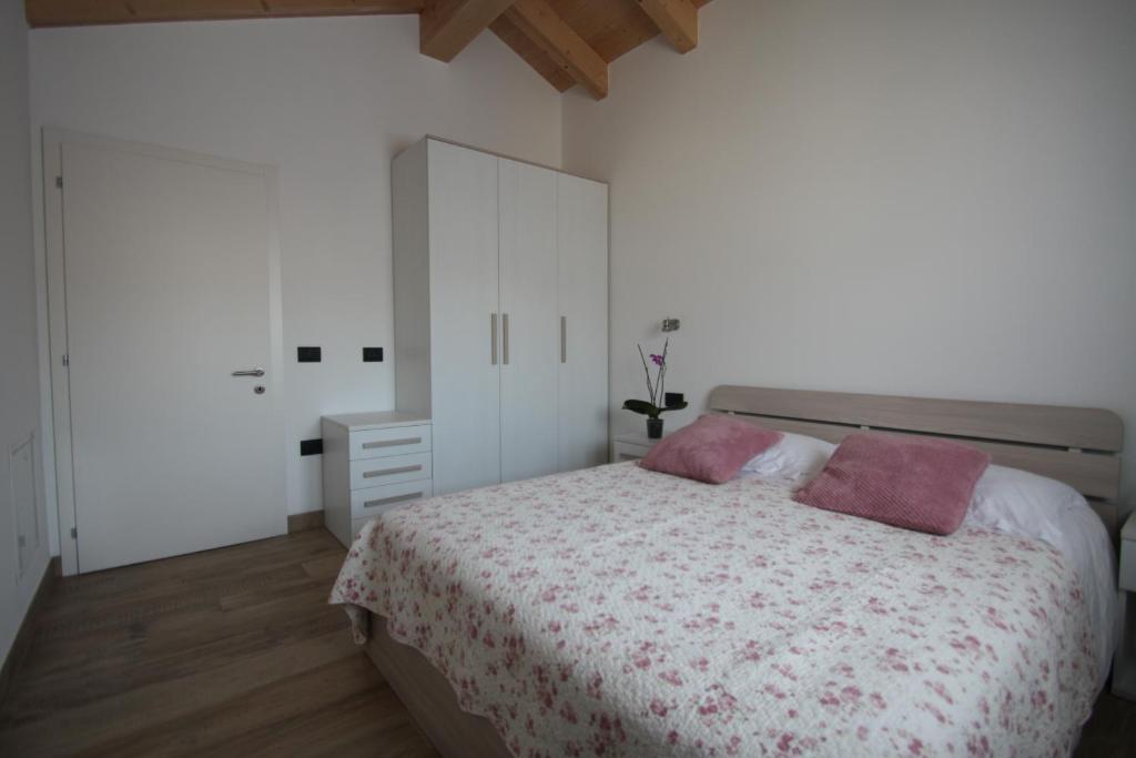 Postel nebo postele na pokoji v ubytování Casa ai Stabli
