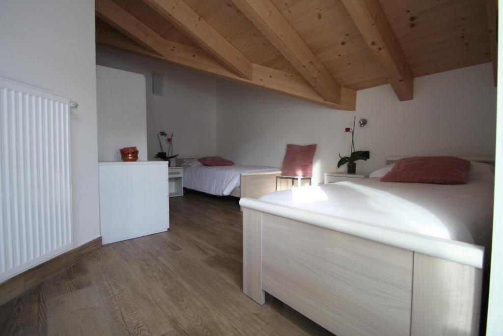 Postel nebo postele na pokoji v ubytování Casa ai Stabli