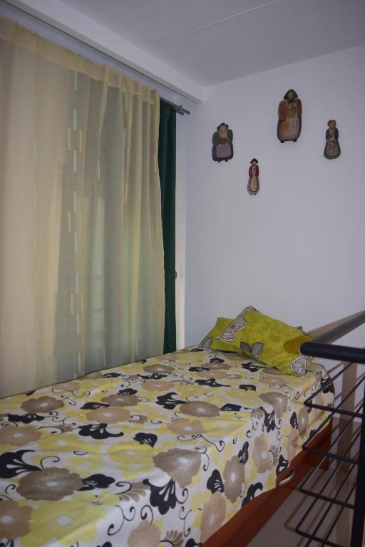 Postel nebo postele na pokoji v ubytování Vespri Siciliani