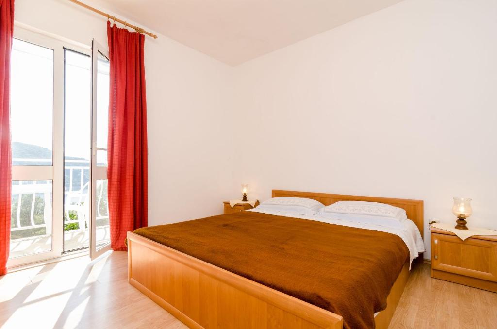 Postel nebo postele na pokoji v ubytování Guest House Kralj