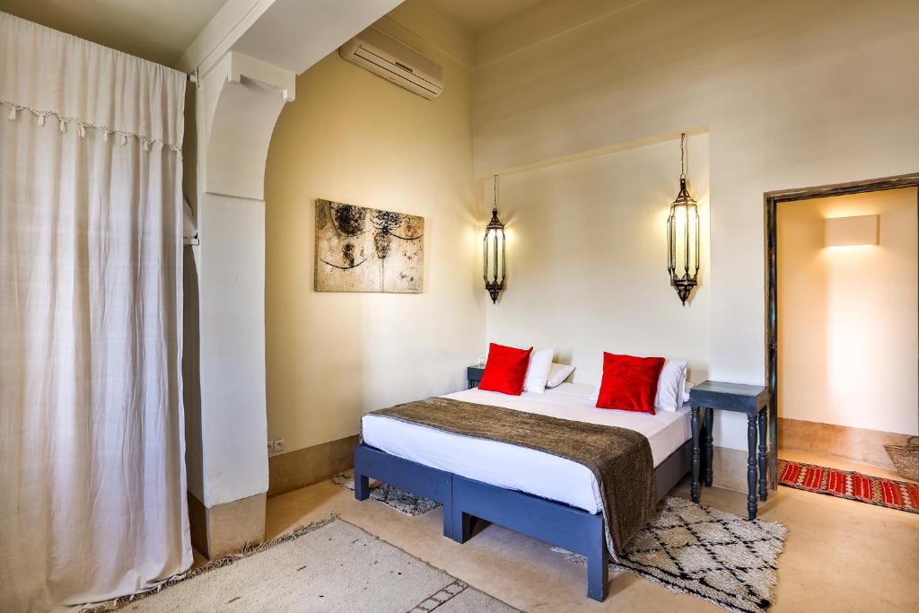 Postel nebo postele na pokoji v ubytování Hotel & Spa Dar Bensouda
