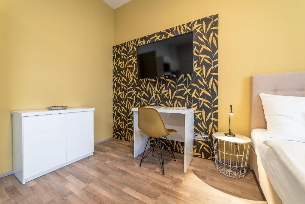 Telewizja i/lub zestaw kina domowego w obiekcie MyApartment in the city center