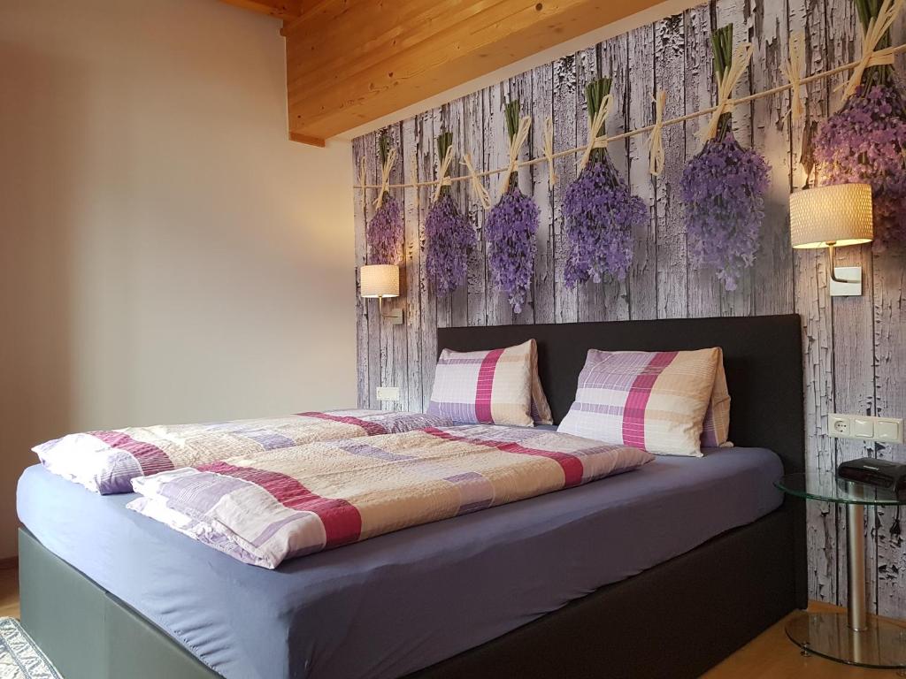 Postel nebo postele na pokoji v ubytování Hotel Gletschermühle