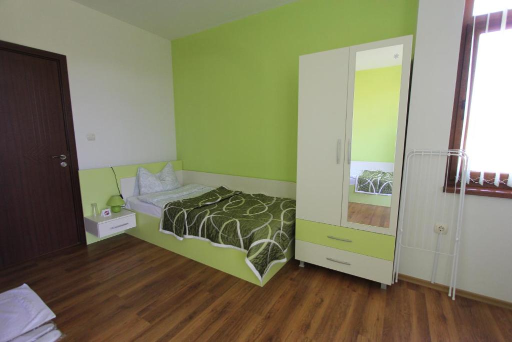 Postel nebo postele na pokoji v ubytování Guest House Arima