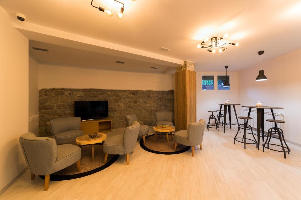 TV a/nebo společenská místnost v ubytování Hotel Onyarbi
