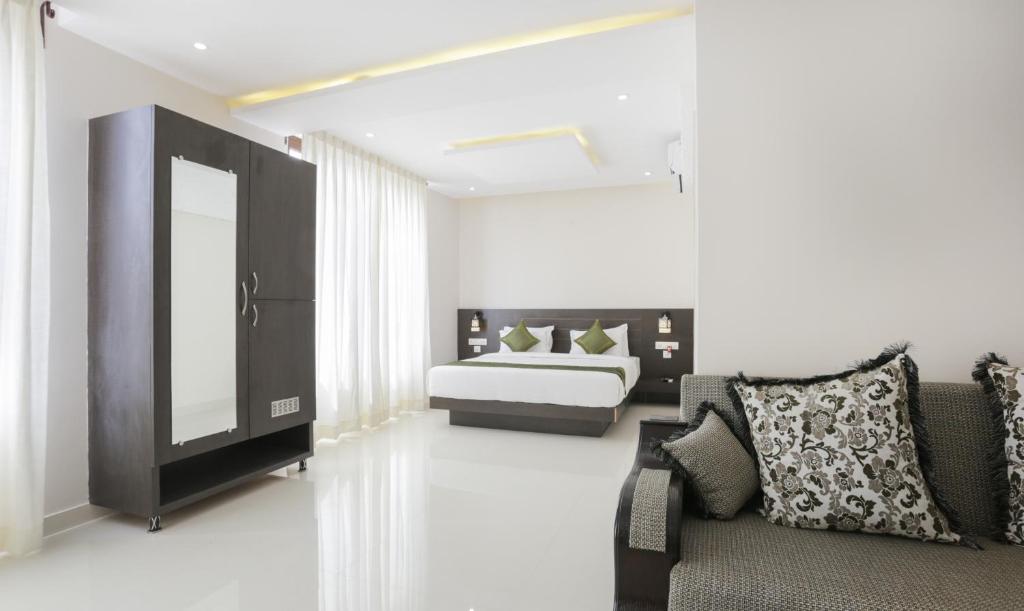 Posezení v ubytování Treebo Sunrise IG Road