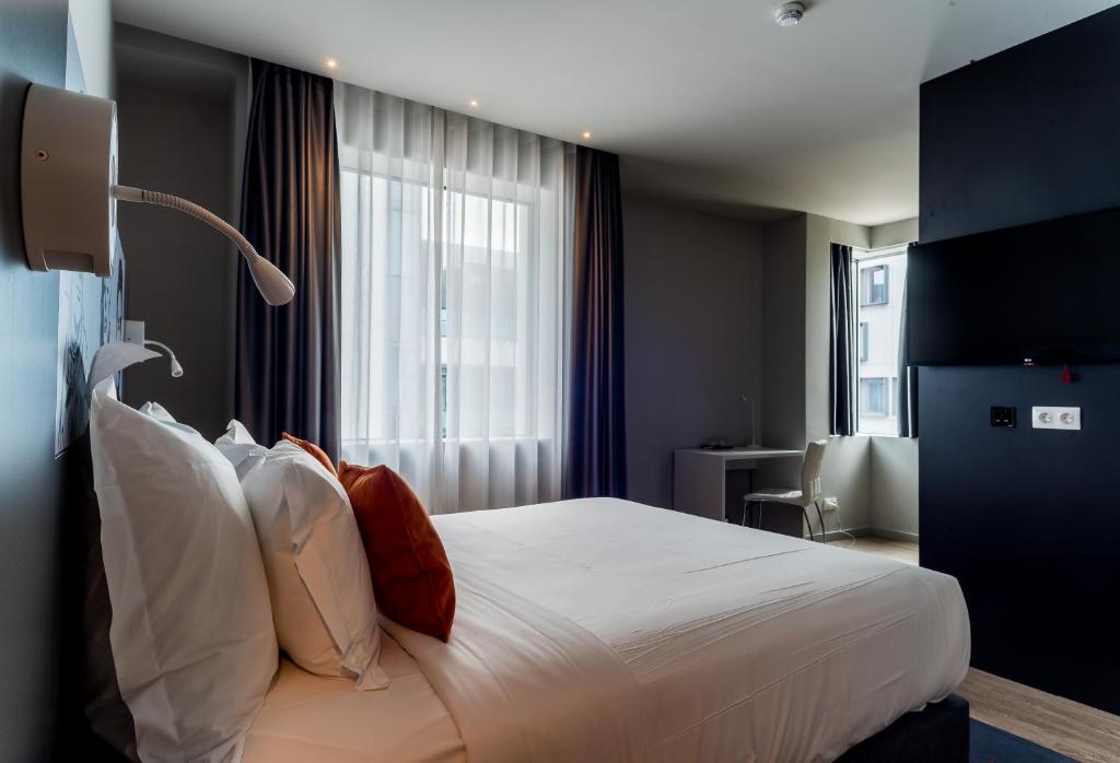 Uma cama ou camas num quarto em Star inn Lisbon Airport