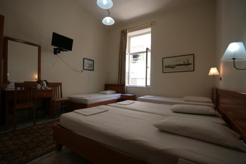 Posteľ alebo postele v izbe v ubytovaní Lena Hotel