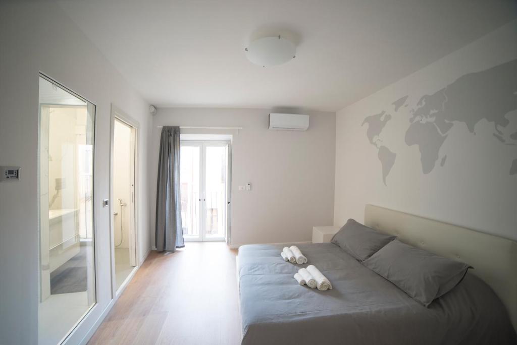 Postel nebo postele na pokoji v ubytování Suite Dreams