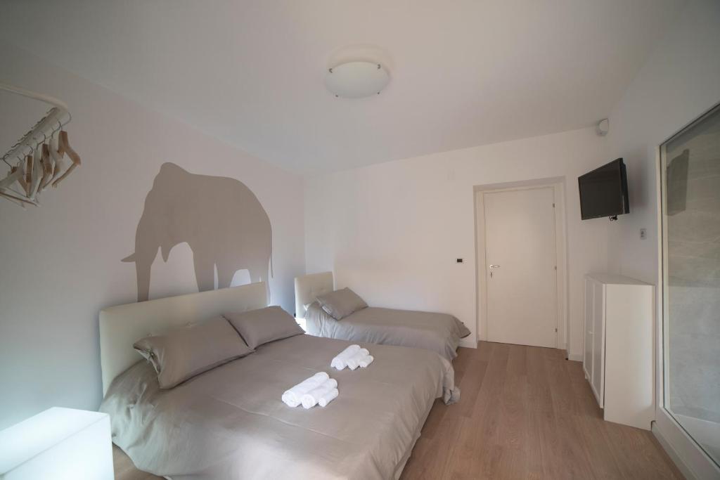 Postel nebo postele na pokoji v ubytování Suite Dreams