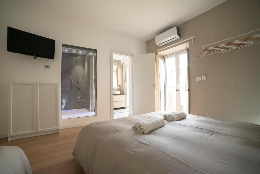Postel nebo postele na pokoji v ubytování Suite Dreams