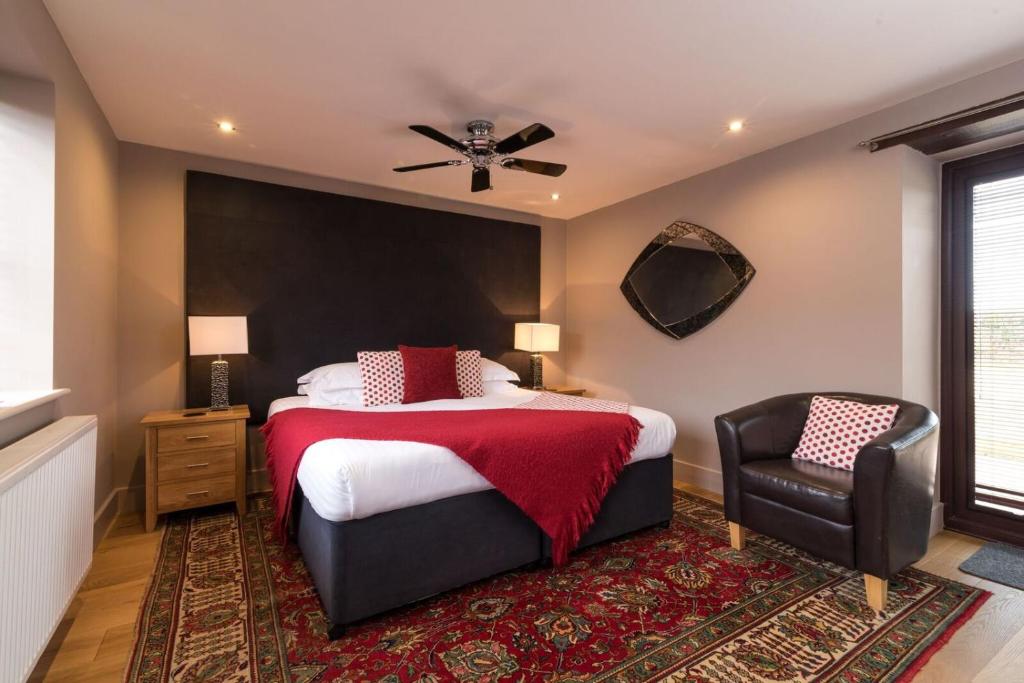 Postel nebo postele na pokoji v ubytování Briarfields Hotel