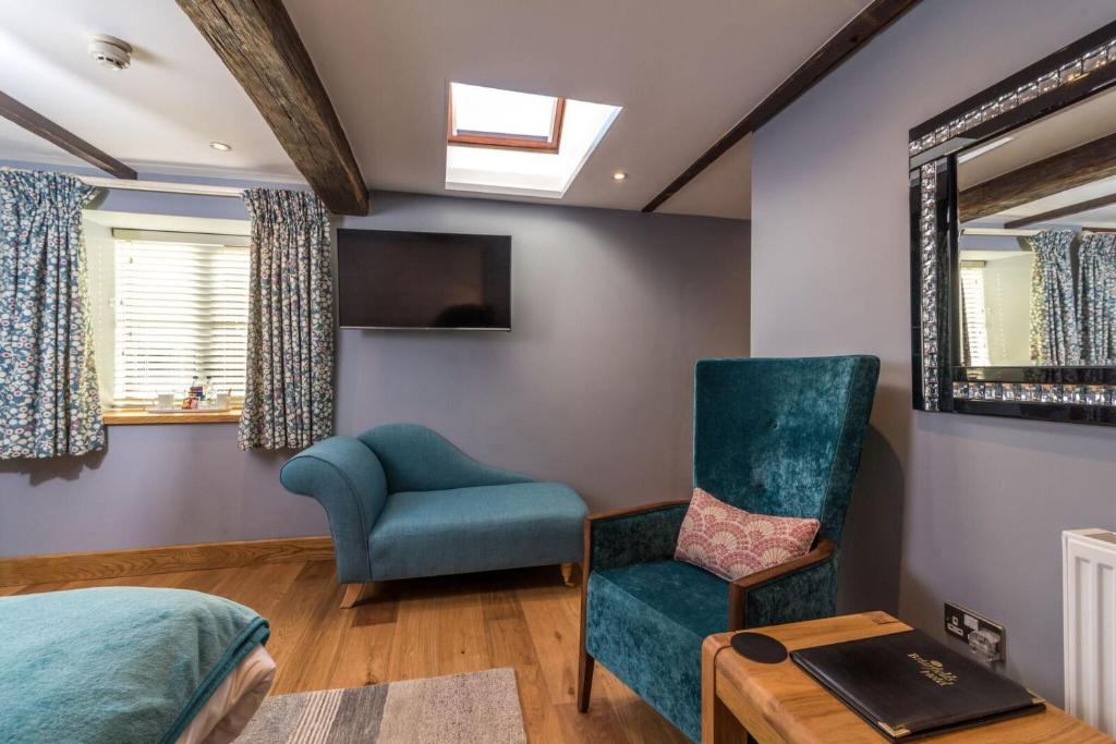 TV a/nebo společenská místnost v ubytování Briarfields Hotel