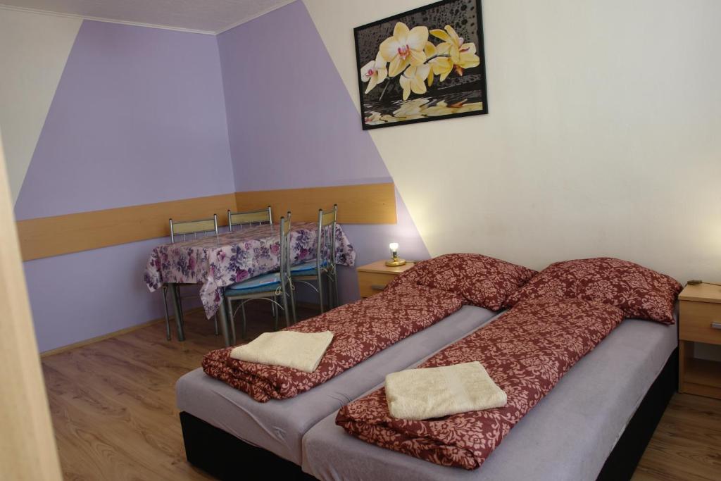 Postel nebo postele na pokoji v ubytování Apartment Tatranská Štrba