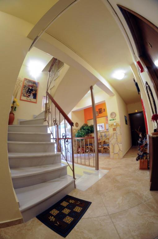 Fotografie z fotogalerie ubytování Nefeli Rooms v destinaci Pefki