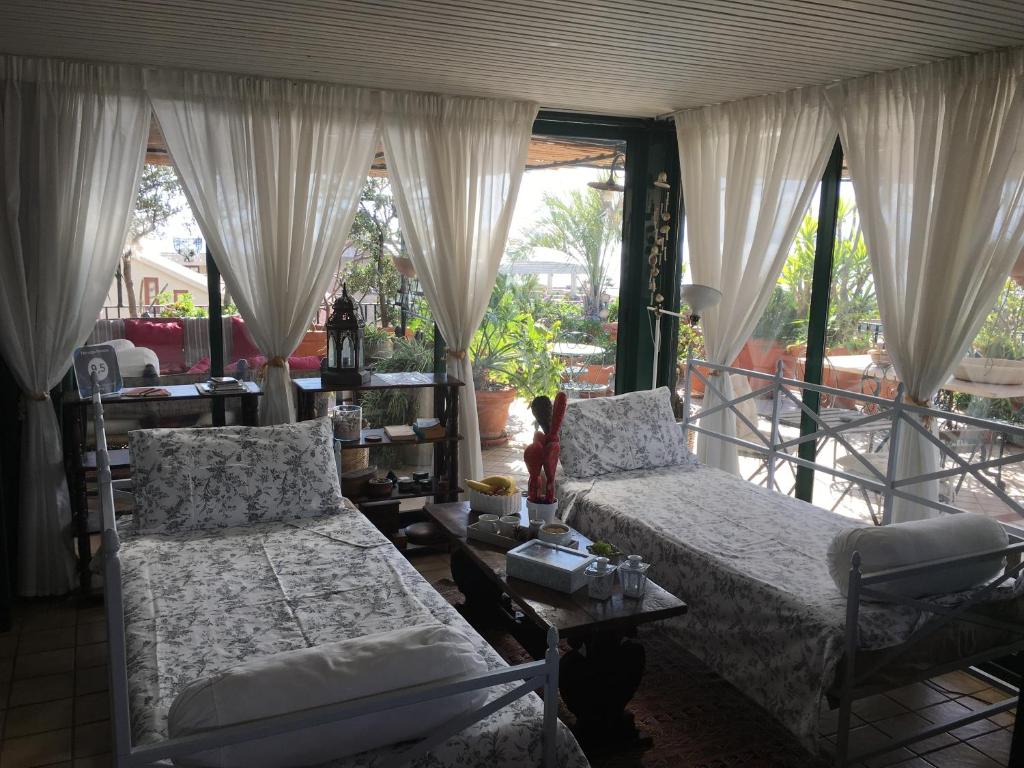 Posedenie v ubytovaní Terrazza Pavone