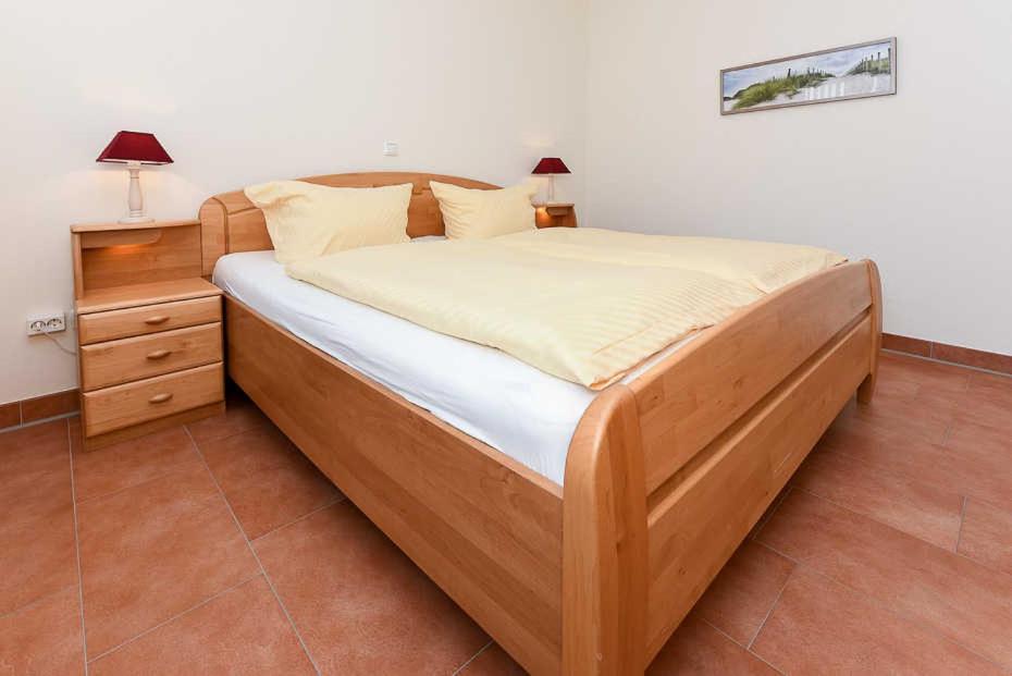 Postel nebo postele na pokoji v ubytování Haus Benser Riff