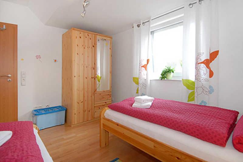 Postel nebo postele na pokoji v ubytování Haus Benser Riff