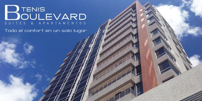 un edificio alto con las palabras quema suites y apartamentos boulevard en Executive Suite - QUITO, en Quito