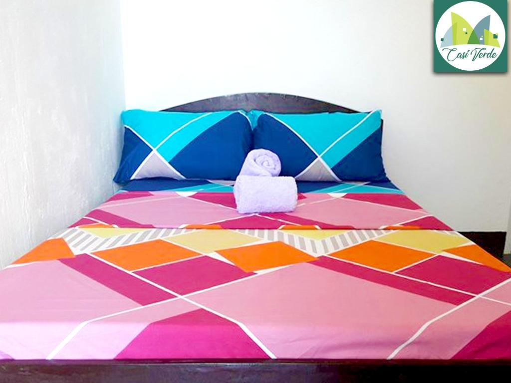 Ліжко або ліжка в номері Casi Verde