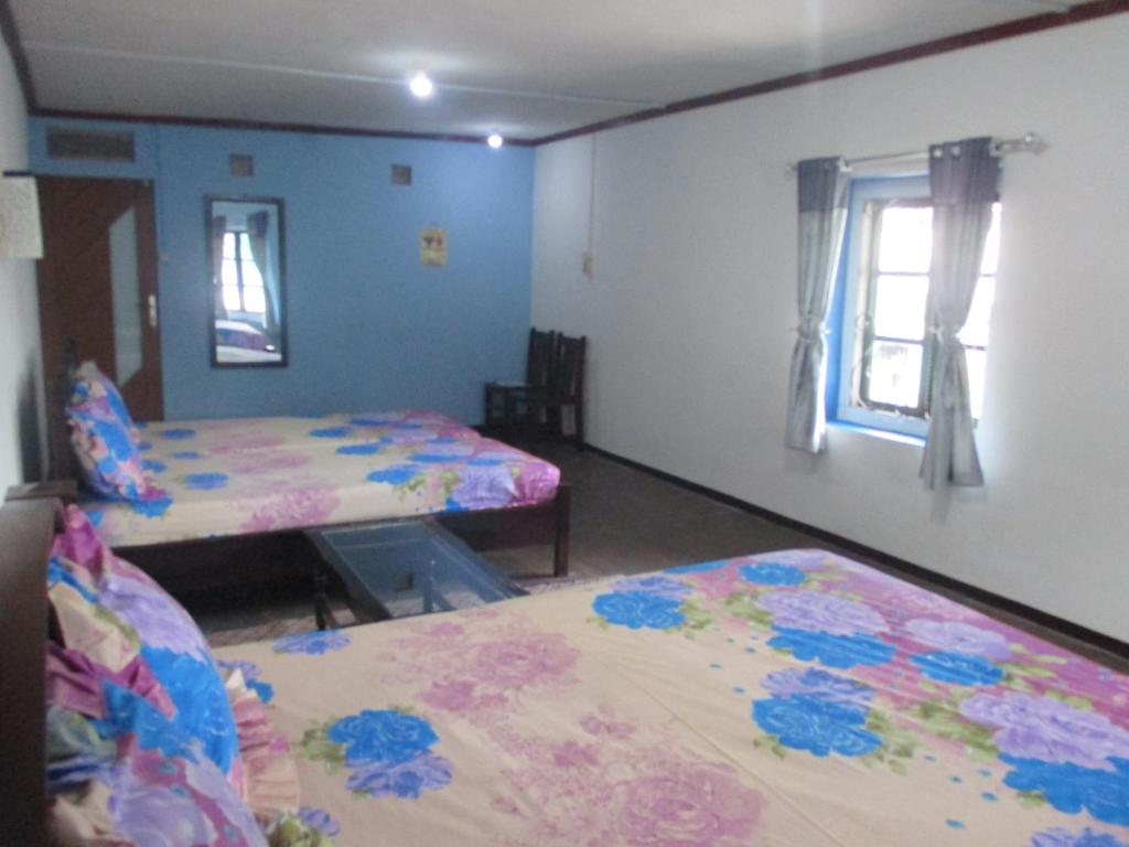 MJR Ticketing Guest House - Habitación Familiar Con Baño Compartido