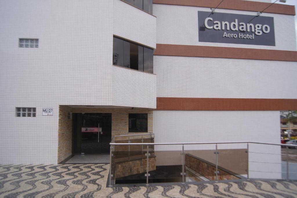 a building with a sign on the side of it at Candango Aero Hotel in Brasilia
