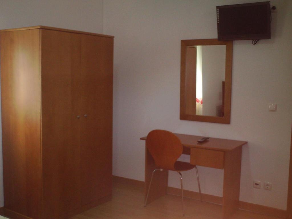 TV a/nebo společenská místnost v ubytování Hotel Serafim