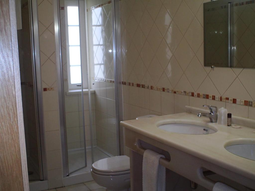 Koupelna v ubytování Hotel Serafim