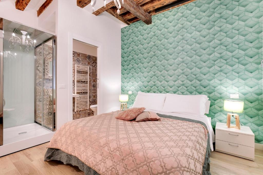 Säng eller sängar i ett rum på Rialto Prestige - Campo S.Maria Formosa