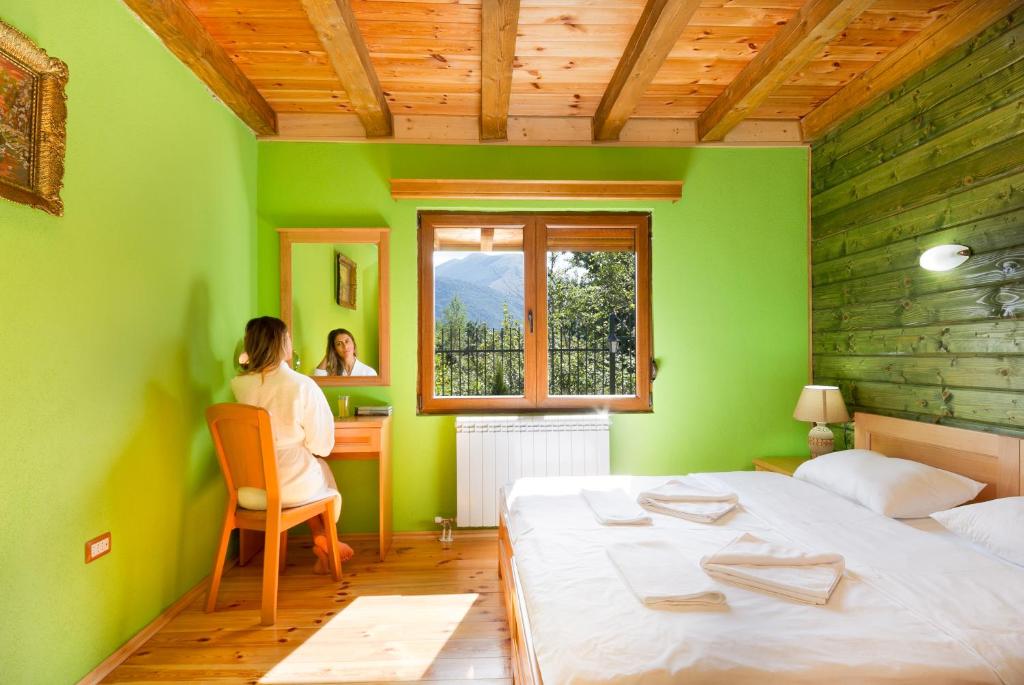 Postel nebo postele na pokoji v ubytování Hotel & Resort Gacka