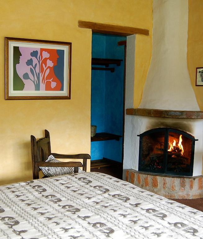 Postel nebo postele na pokoji v ubytování Las Palmeras Inn
