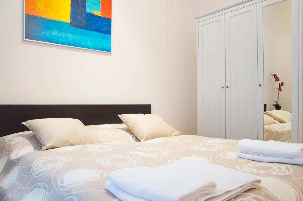 Posteľ alebo postele v izbe v ubytovaní Modern Apartments Opatovická