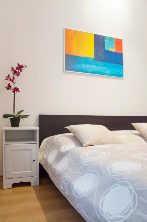 Posteľ alebo postele v izbe v ubytovaní Modern Apartments Opatovická