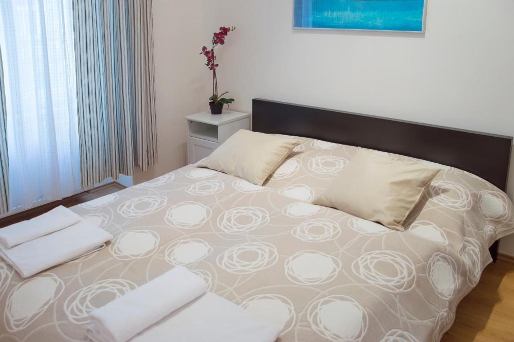 Posteľ alebo postele v izbe v ubytovaní Modern Apartments Opatovická
